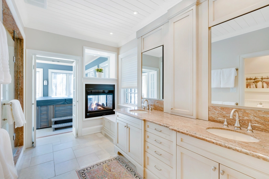 Bright, spotless bathroom with marble countertops